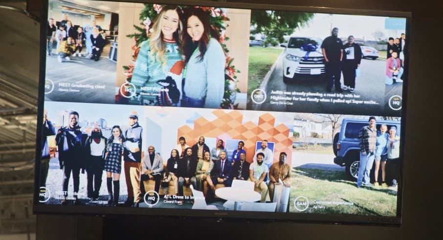 Photo of Carvana Collective on a TV at their headquarters